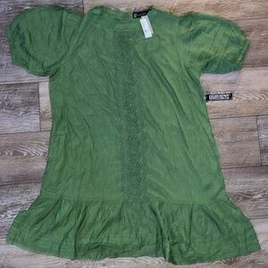 Beautiful dress-detailed embroidery down center of dress. Brand new with tags!